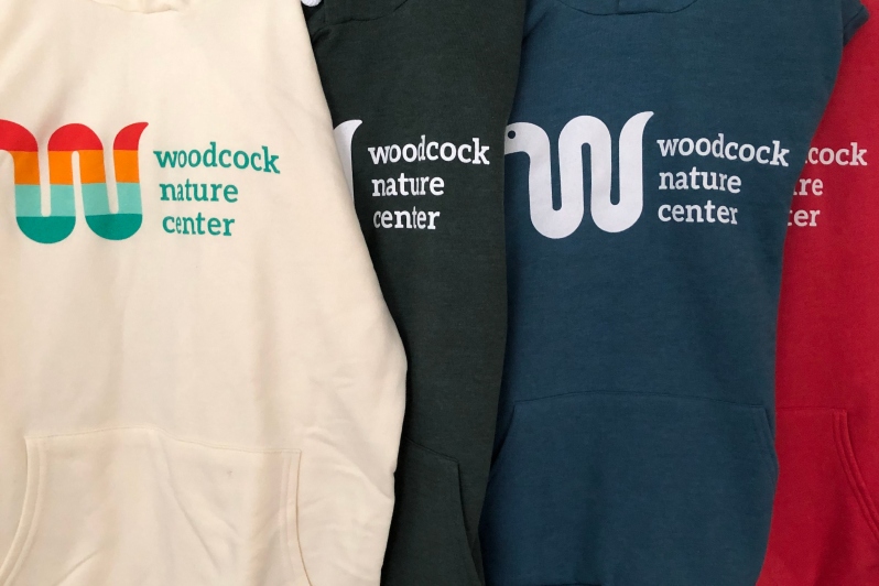 Product Description: Woodcock Hoodie</br>Stay cozy and sport your Woodcock Nature Center pride this winter in this super soft hoodie.Available in cream with the colorWoodcock logo and heathered forest green, teal or red with the white Woodcock logo.</br></br>Adult sizes from XS-XL</br>(Adut size chart)</br></br>Price $45 plustax</br></br>*Youth sizes available in Heathered Forest Green ONLY.</br></br>Youth sizes from YS- YL</br>(Youth size chart)</br></br>Price $45 plus tax</br></br>*Shipping is not available. All items must be picked up at Woodcock Nature Center during designated times.</br> Woodcock Hoodie