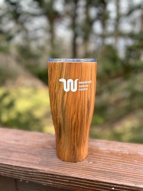 Product Description: 28 oz. Wood grain color Stainless Steel Tumbler with plastic lid printed with Woodcock Logo in White</br> Tumbler
